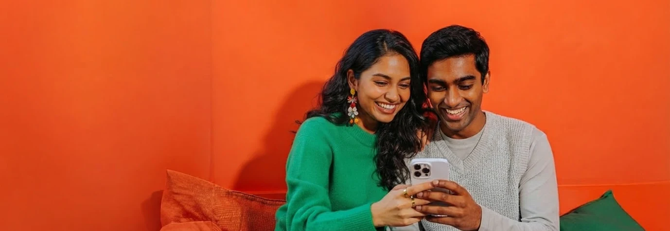 Two shoppers discovering products together on their phone